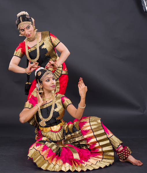 Akam poems focus on love. Shown here are is a friend (Lavanya Govindarajan) dressing up the heroine (Prathiba Natesan Batley). Photo Credit: Prasad Golkonda